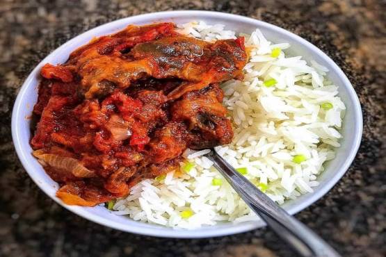 Plain Rice With stew and Goat
